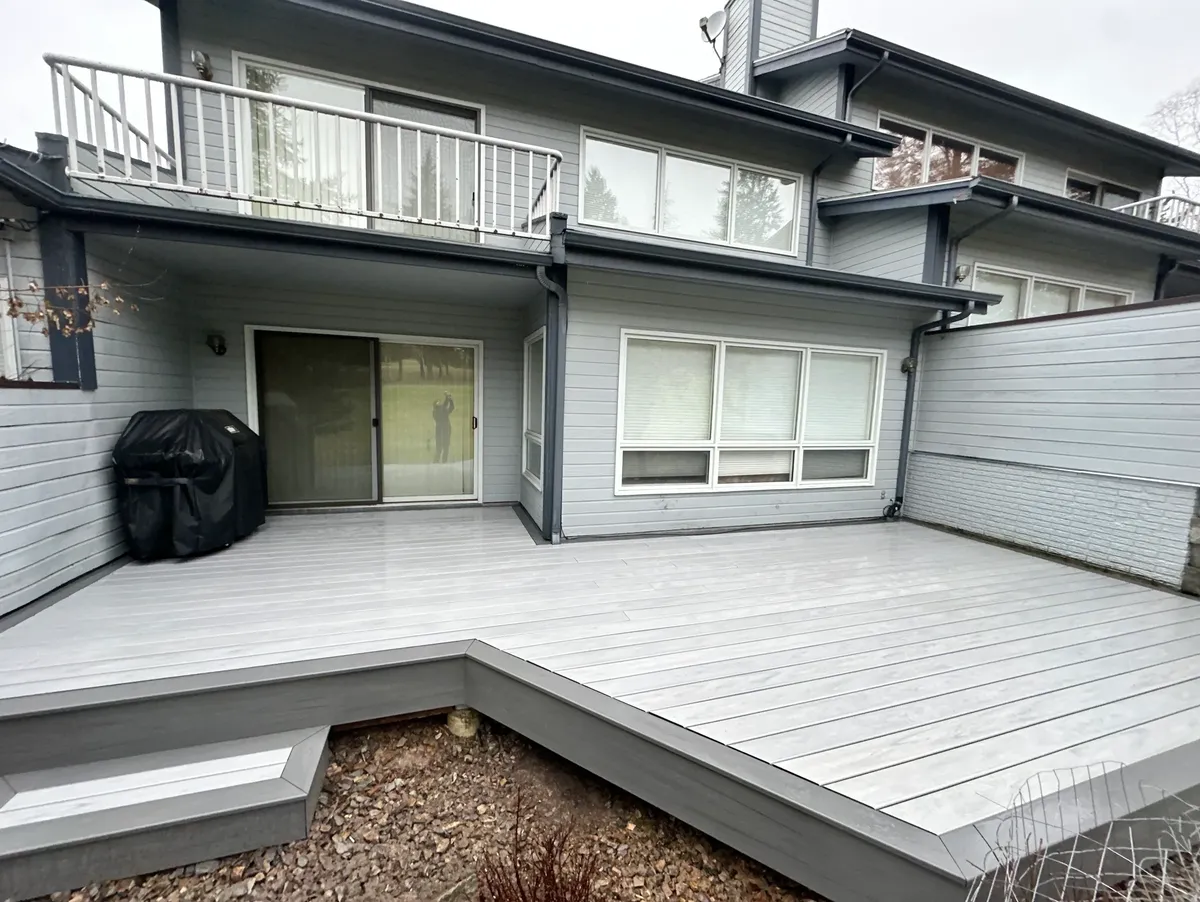 Modern house with spacious wooden deck.
